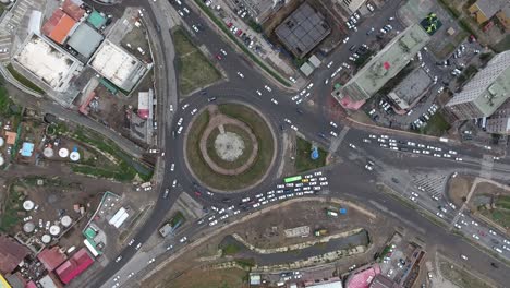 Aerial-drone-shot-roundabout-from-top-view-in-Ulan-Bator-Mongolia-traffic-time